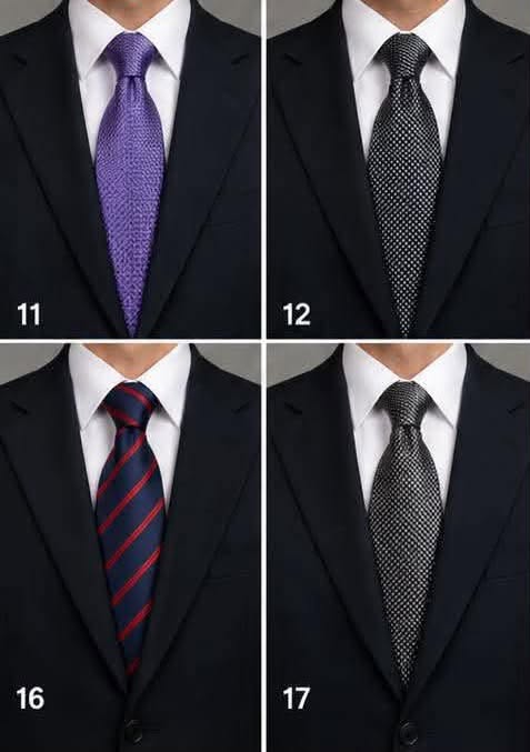Four dark neckties in purple, black, and navy styled with suits